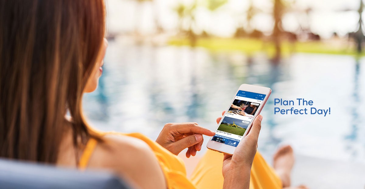 woman with phone showing an app